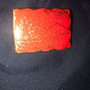 Red and gold pin